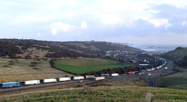 Lorries queue for The Port of Dover along the A20 in Kent