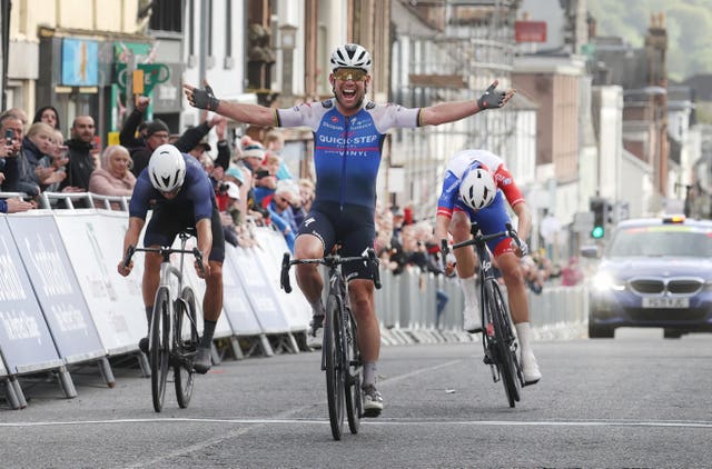 Mark Cavendish (centre) won a three-way sprint for the line to claim a second British National Road Championship title - and first for nine years - in Castle Douglas (Steve Welsh/PA).