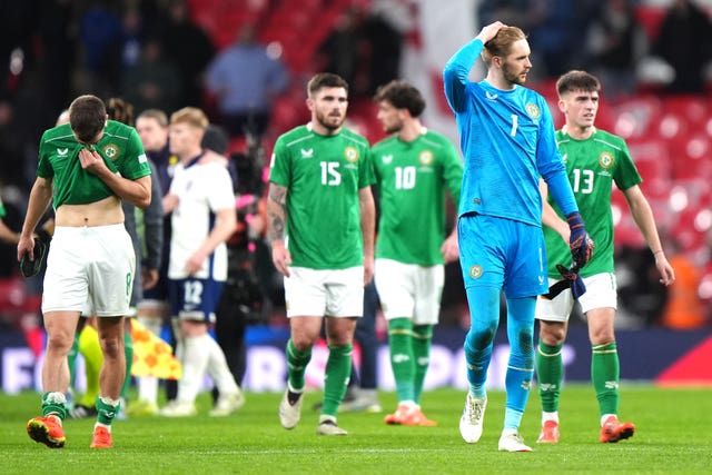Republic of Ireland goalkeeper Caoimhin Kelleher (second right) and team-mates look dejected following defeat by England at Wembley