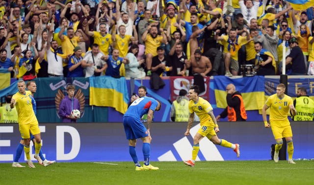 Ukraine’s Mykola Shaparenko celebrates scoring his side's first goal against Slovakia 