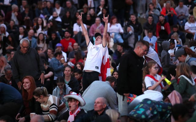 England fans celebrate at Devonshire Green as they watch on the big screen