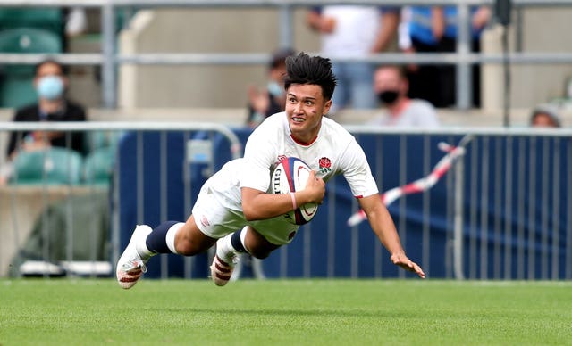 England’s Marcus Smith dives in to score