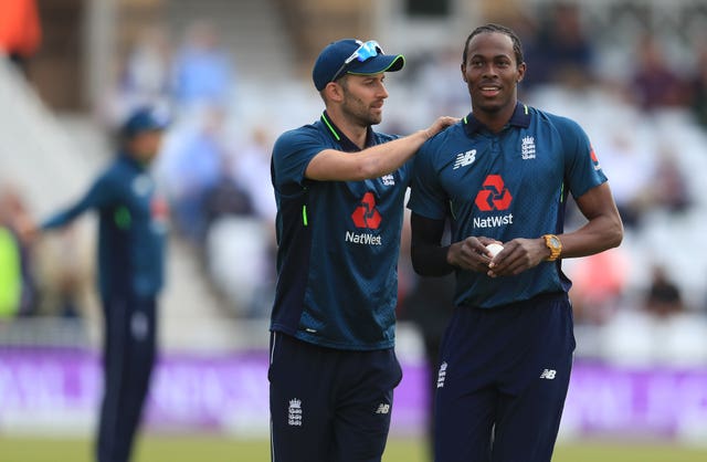 Jofra Archer and Mark Wood converse during an ODI