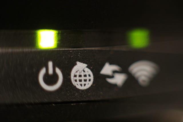 TThe lights on the front panel of a broadband internet router, London