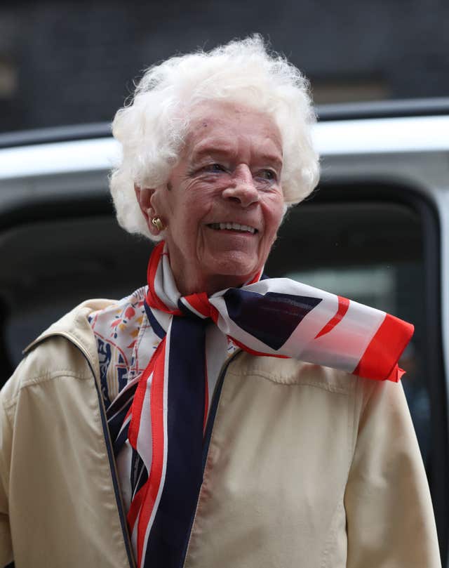 Second World War Air Transport Auxiliary pilot Mary Ellis, who delivered Spitfires, arrives in Downing Street, London (Jonathan Brady/PA)