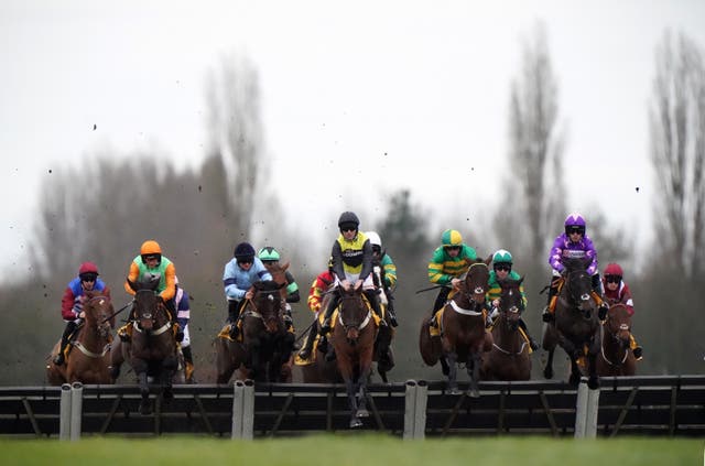 Aucunrisque ridden by Nick Scholfield (centre) before going on to win the Betfair Hurdle at Newbury