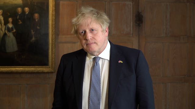 Boris Johnson delivering a statement at his country residence Chequers
