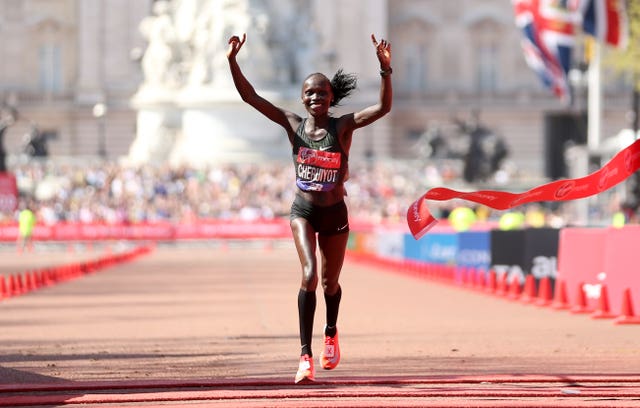 Vivian Cheruiyot crosses the line first to win the women's London Marathon title