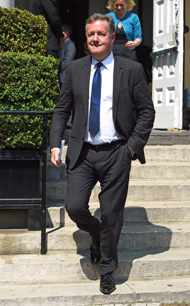 Piers Morgan leaves the church after the funeral service (Kirsty O'Connor/PA)