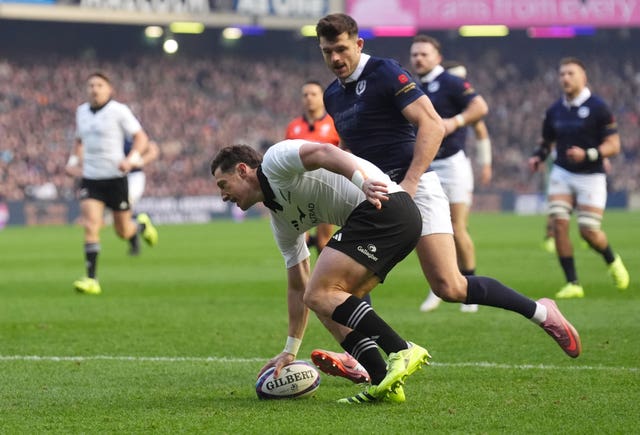 New Zealand’s Cam Roigard scores their first try 
