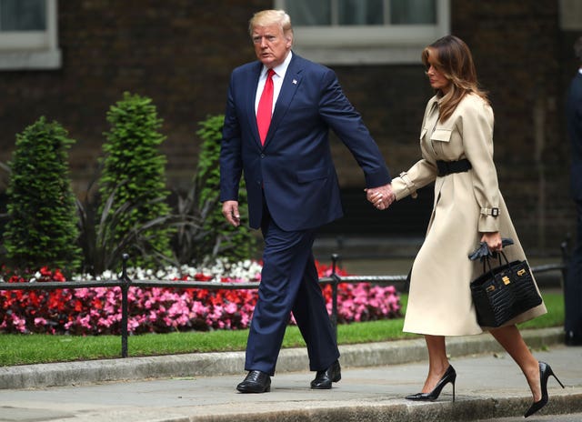 US President Donald Trump and first lady Melania Trump arrive in Downing Street, London, on the second day of his state visit to the UK.