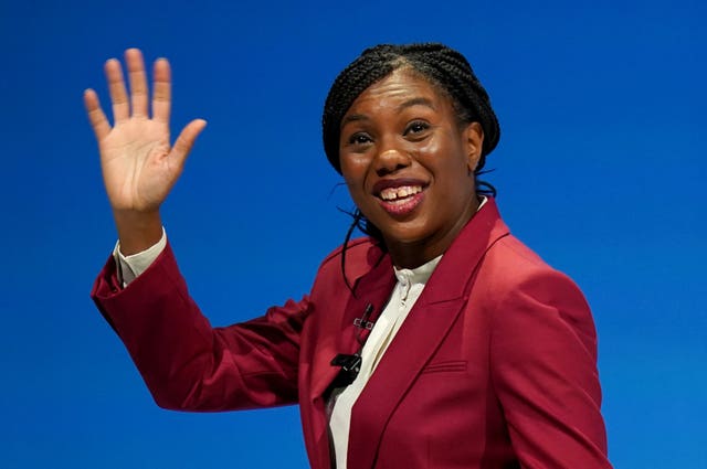 Kemi Badenoch waves as she leaves the stage after speaking at the Conservative Party conference