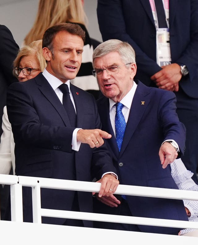 France president Emmanuel Macron, left, and International Olympic Committee president Thomas Bach at the Paris 2024 Olympic Games opening ceremony