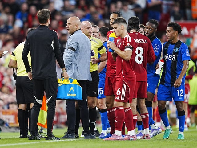 Referee Anthony Taylor during a stop in play at Anfield in August