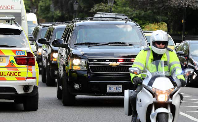 A motorcade arrives at Winfield House