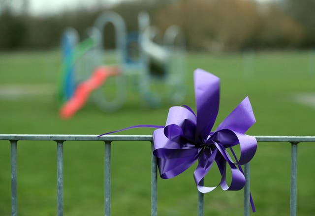 A purple bow attached to railings in St Neot’s Road, Harold Hill, east London, in memory of 17-year-old Jodie Chesney