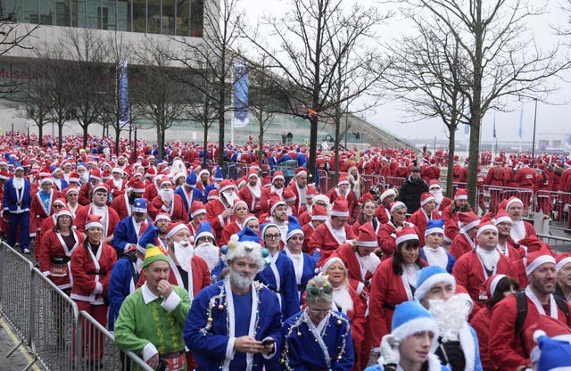 Hundreds of costumed runners wait for the race to begin 