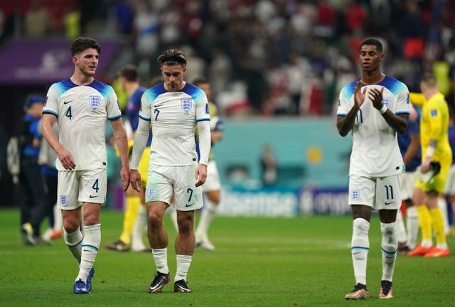 England’s Declan Rice, Jack Grealish and Marcus Rashford appear dejected 