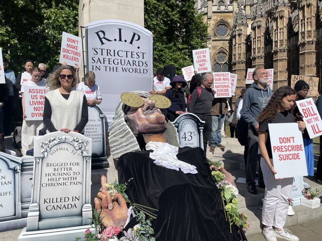 Campaigners opposing the assisted dying legislation demonstrate outside the Palace of Westminster in London, ahead of the Terminally Ill Adults (End of Life) Bill’s report stage