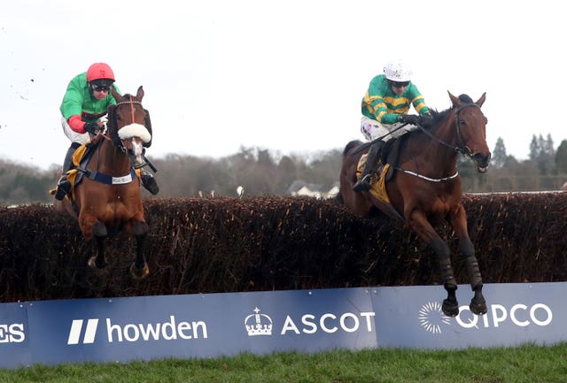 Fakir D’Oudairies (right) leads Two For Gold over the final fence in last year's race