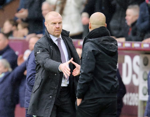 Burnley boss Sean Dyche, left, and Manchester City manager Pep Guardiola 
