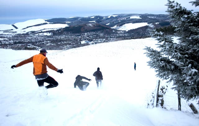 Cross-country runners set off through heavy snow around Peebles in the Scottish Borders 