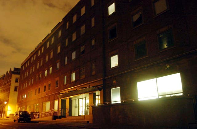 The SIAC building exterior seen at night