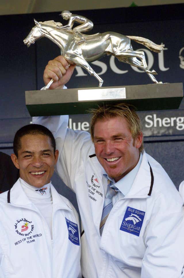 Shane Warne with the trophy at the Shergar Cup 