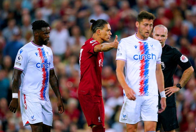Darwin Nunez, centre, argues with referee Paul Tierney during Liverpool's draw with Crystal Palace