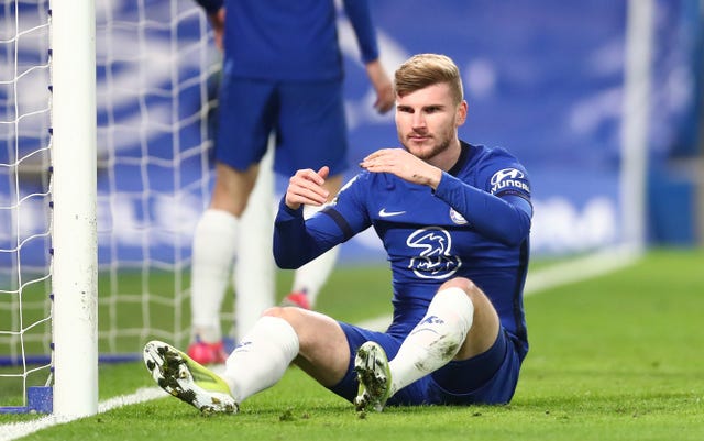 Chelsea’s Timo Werner sits dejected after missing a chance
