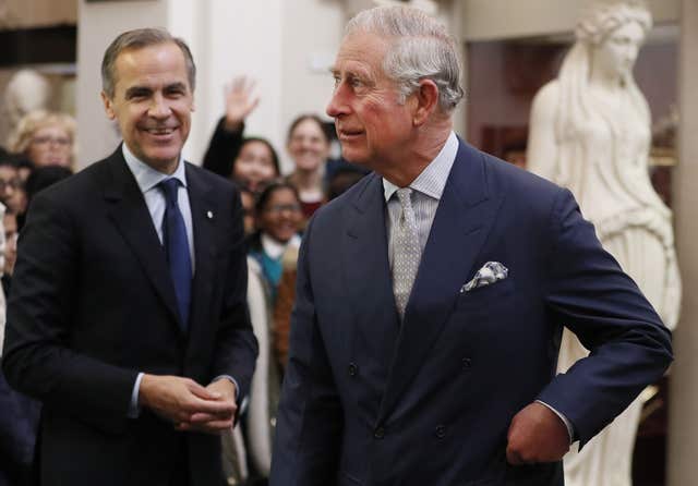 The then-Bank of England governor Mark Carney with the then-Prince of Wales during a tour of the Bank of England in 2016 