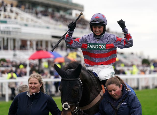 Bryony Frost celebrates winning at Aintree 