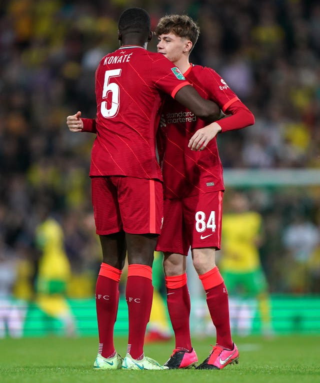 Liverpool’s Ibrahima Konate embraces Conor Bradley 