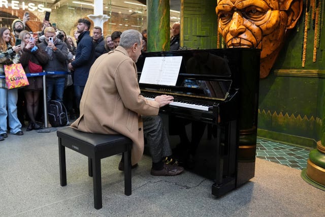 Jeff Goldblum playing a piano