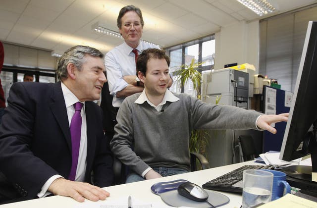 Gordon Brown sending a tweet on a visit to the Disasters Emergency Committee