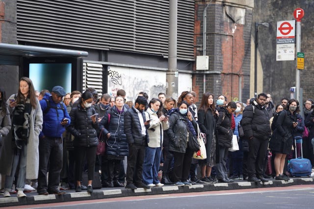 People waiting for buses at Waterloo station 