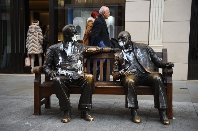 The figures of Franklin D Roosevelt and Winston Churchill on the Allies sculpture in New Bond Street, London, which has been vandalised with white paint 