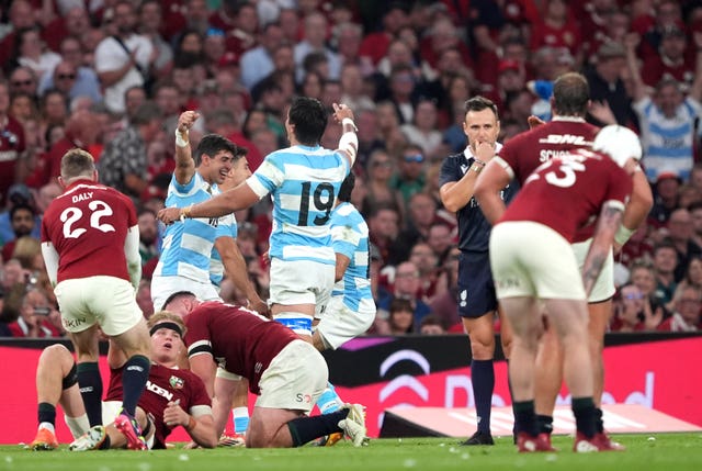 Argentina celebrate while British and Irish Lions players look despondent at the final whistle of Friday's match in Dublin