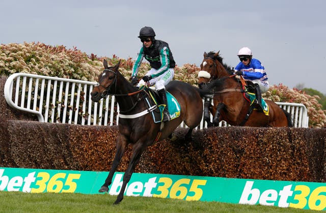 Altior and Nico de Boinville go on to win the bet365 Celebration Chase at Sandown
