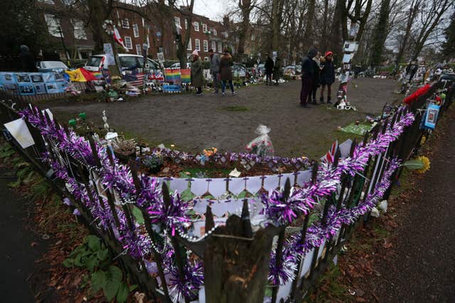 Tributes are left opposite the home of singer George Michael in The Grove, Highgate, London (Jonathan Brady/PA)