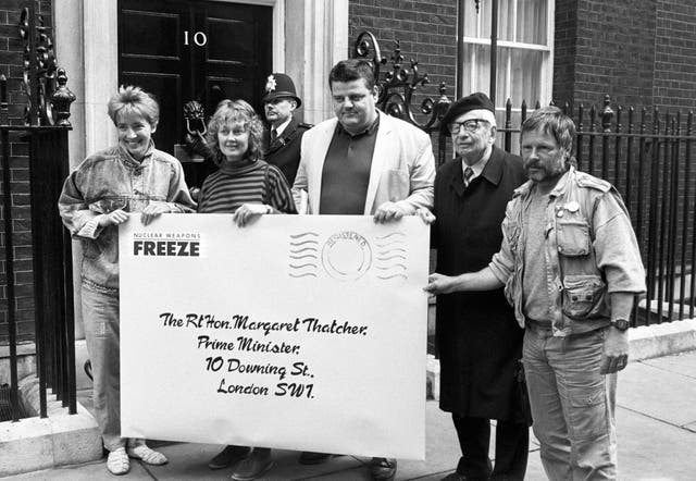 A giant envelope containing a letter calling for Britain to support a nuclear bomb test ban treaty is delivered to the Prime Minister on October 1 1987. From the left are celebrities Emma Thompson, Anna Carteret, Robbie Coltrane and Bill Oddie with second from the right Sir Rudolf Peierls, the designer of the first atom bomb, in a beret
