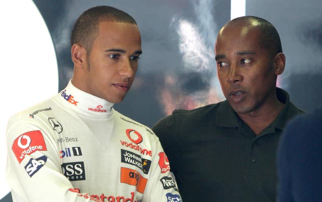 Lewis Hamilton, left, with his dad Anthony 