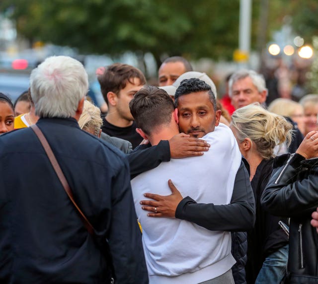 Family and friends of Tashan Daniel at a vigil held at Hillingdon station