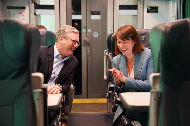 Labour Party leader Sir Keir Starmer, left, and shadow chancellor Rachel Reeves on a train 