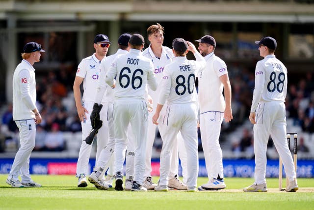 Josh Hull, centre, celebrates a wicket