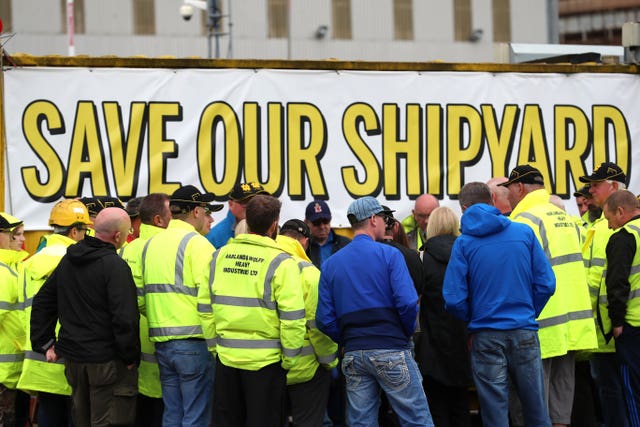 Harland and Wolff workers listen to union officials