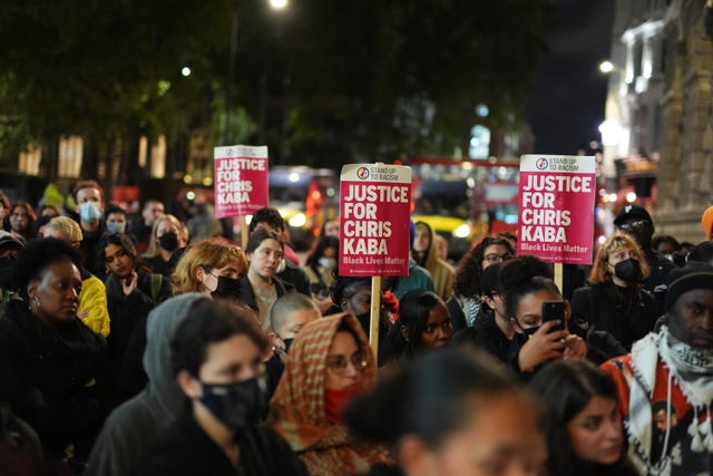 People demonstrate outside the Old Bailey in central London. 