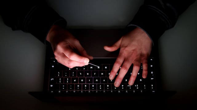 Someone using a laptop 