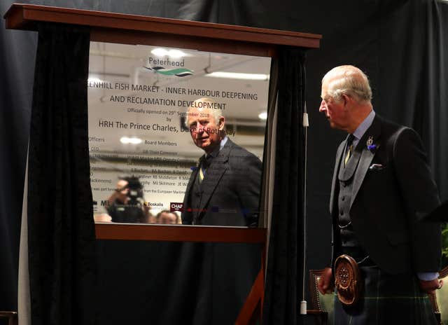 Prince of Waleswith market's opening sign