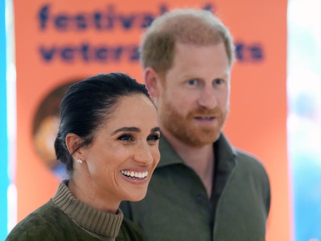 Harry and Meghan arriving at the Australian National Veterans Arts Museum in Southbank, Melbourne